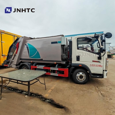 HOWO Τελαχιστοφόρος σκουπιδιών 4X2 5CBM 105CBM Τελαχιστοφόρος σκουπιδιών