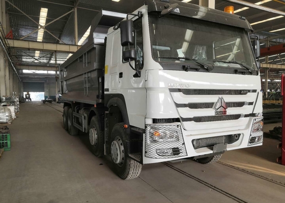 Ο ISO ΠΈΡΑΣΕ SINOTRUK HOWO 8x4 απορρίψεων φορτηγών κατασκευής το διεθνές απορρίψεων φορτηγό απορρίψεων φορτηγών οπίσθιο