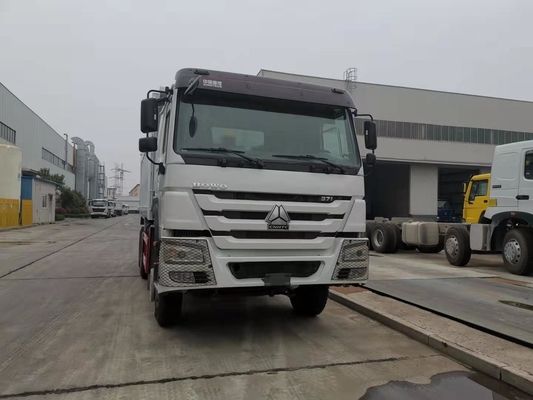 Sinotruk 6x4 10 βαρέων καθηκόντων φορτηγό απορρίψεων ροδών με την ανατροπή της πλατφόρμας σώματος