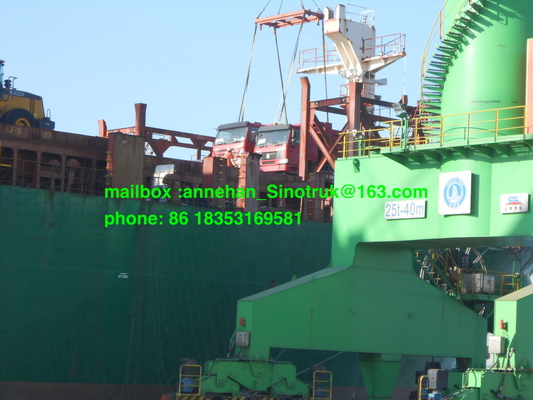 336hp κόκκινη βαρέων καθηκόντων μέση ανύψωση Sinotruk 18m3 φορτηγών απορρίψεων για το φορτίο 40t