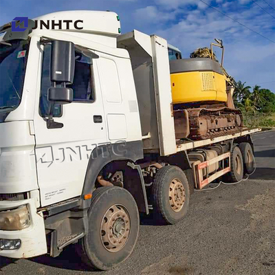 SINOTRUK HOWO 8X4 371hp μετακινούμενο φορτίου κιβωτίων απορρίψεων Tipper δίσκων κρεβατιών φορτηγών επίπεδο