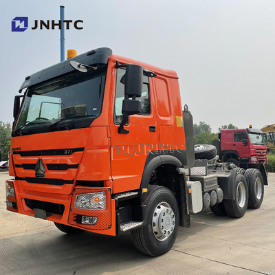 Το Sinotruk HOWO 6x4 10 κυλά το κεφάλι φορτηγών 20ton RHD πρωταρχικό - φορτηγό τρακτέρ μετακινούμενων